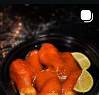 Alitas bañadas en salsa BBQ